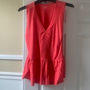Orange sleeveless top